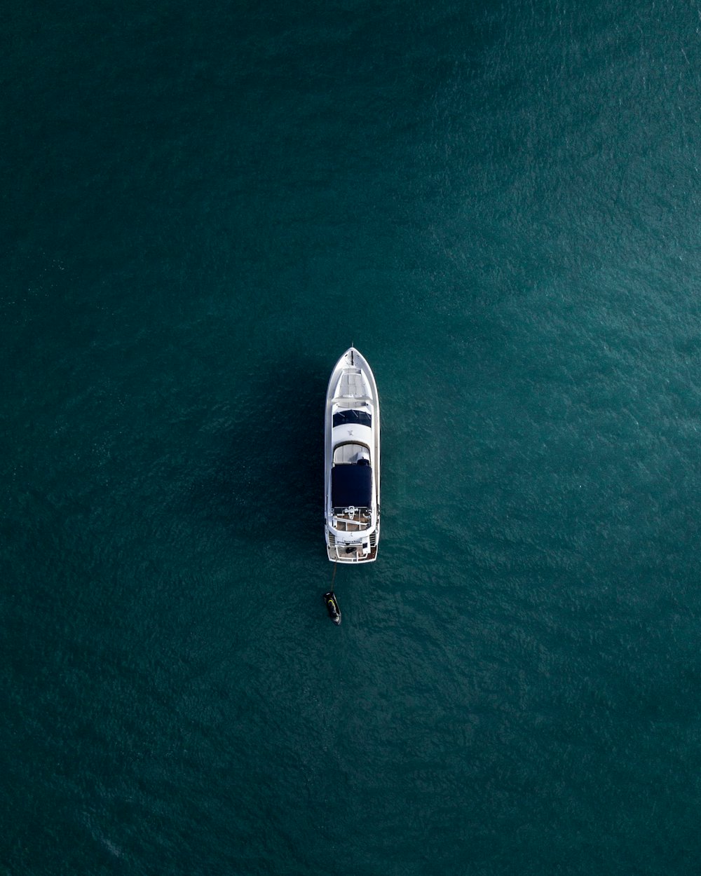 Motor yacht on open water, seen from above
